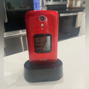 Lively Jitterbug flip phone with two chargers and stand